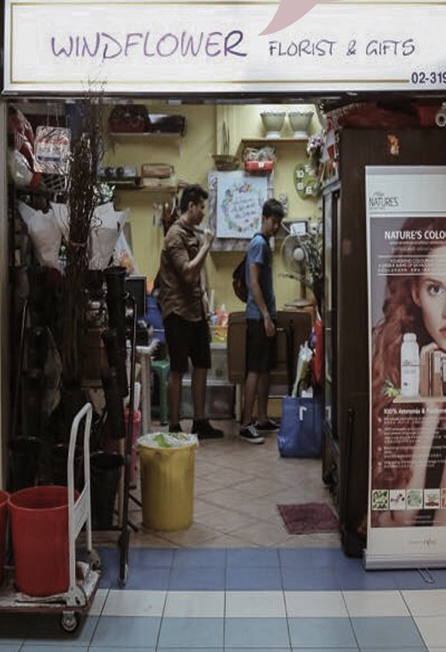 Windflower Florist founder arranging flowers at the studio