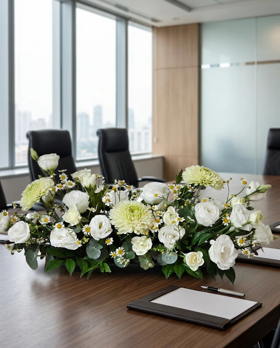 Corporate boardroom floral centerpiece arrangement on a meeting table in a modern office | Windflower Florist