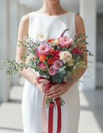 Modern bride holding the Miyabi Bridal Bouquet