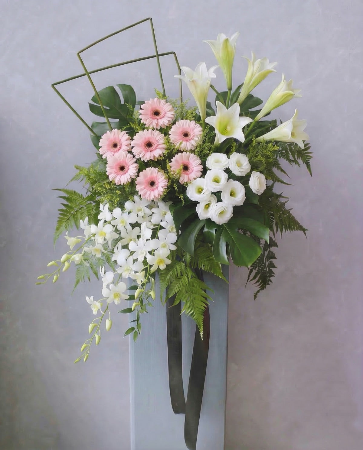 Tender Grace sympathy flower stand with pink gerberas, white lilies and orchids, Singapore same-day delivery