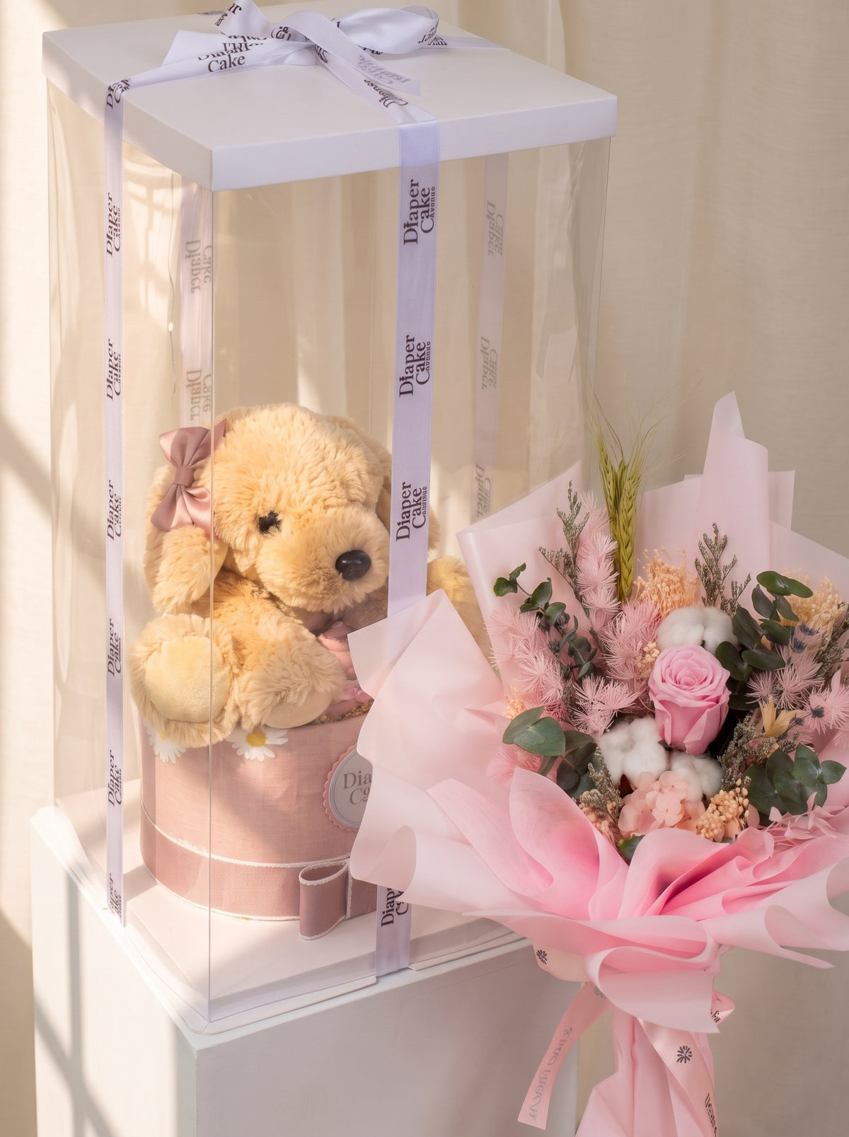 Puppy diaper cake gift box with Eternal Pink preserved bouquet