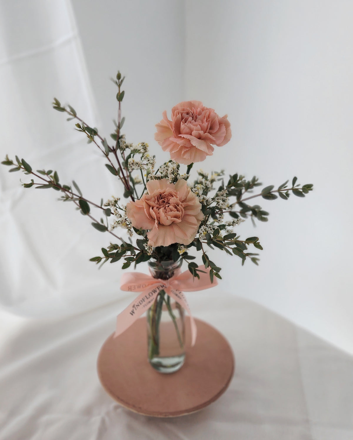 Carnations In Caramel Vase