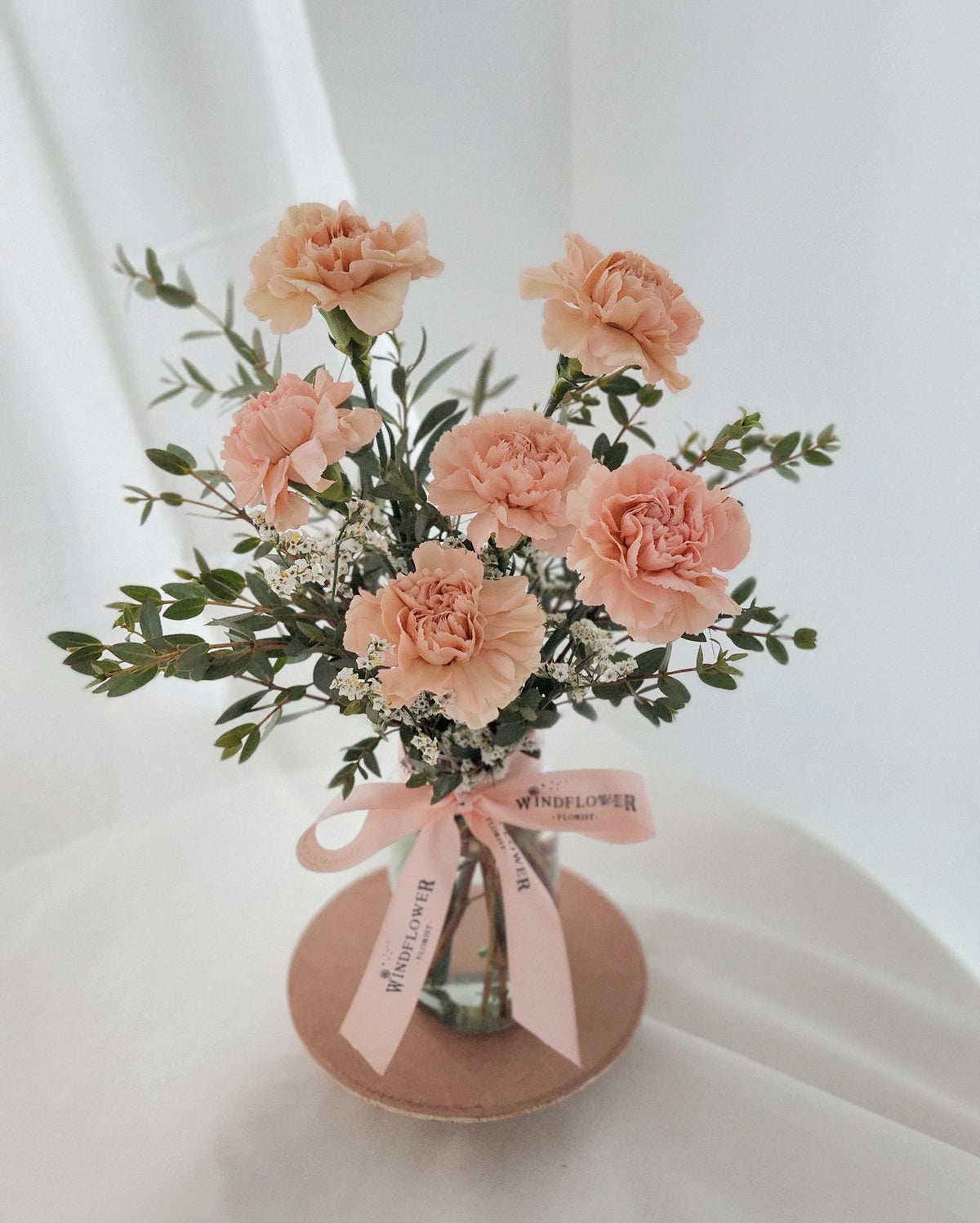 Carnations In Caramel Vase