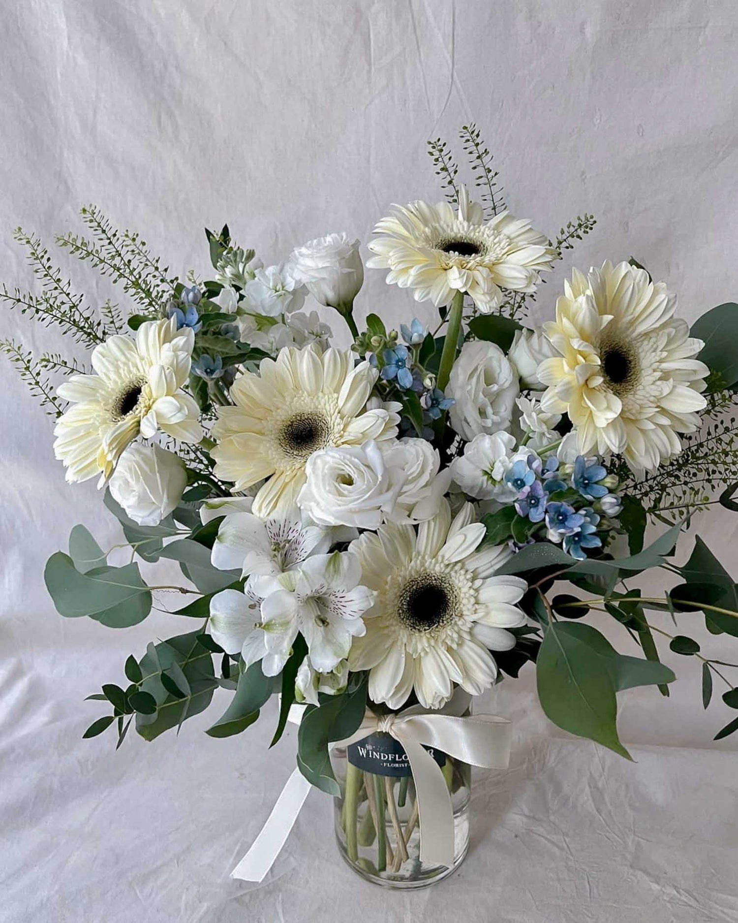 Daisy-Me-Rolling in White Vase | Free Same-Day Flower Delivery Singapore