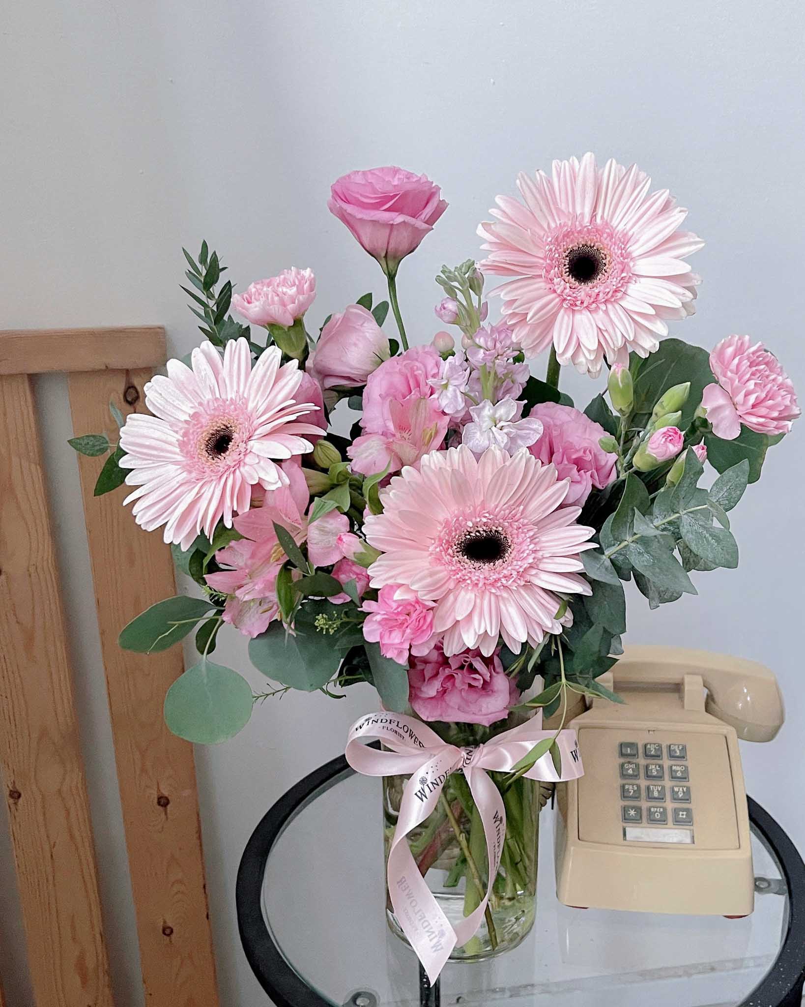 Daisy-Me-Rolling in Pink Vase by Windflower Florist Singapore