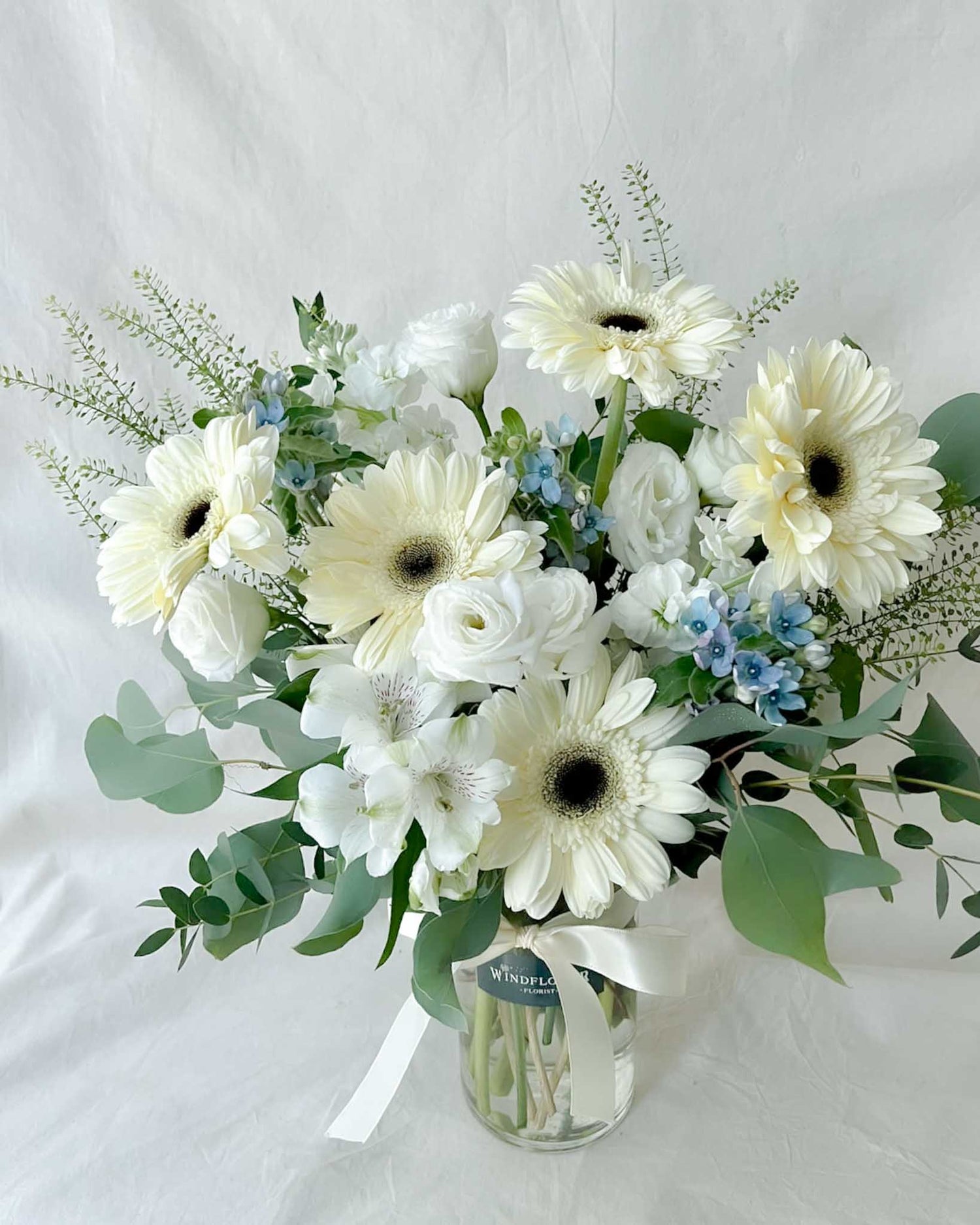 Daisy-Me-Rolling in White Hand Bouquet by Windflower Florist Singapore