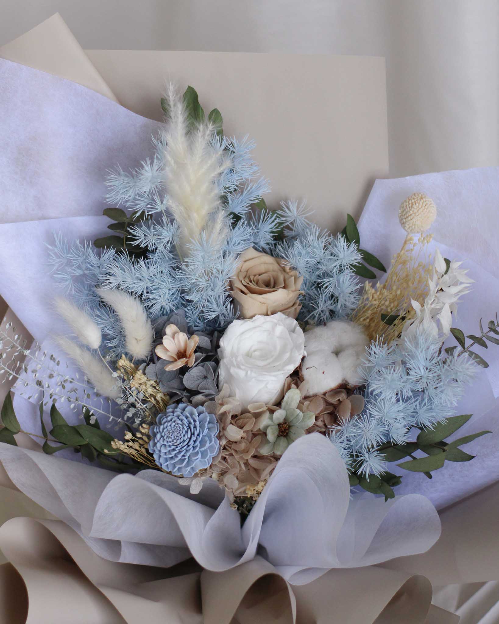 Moonlit Cherub Hand Bouquet by Windflower Florist Singapore