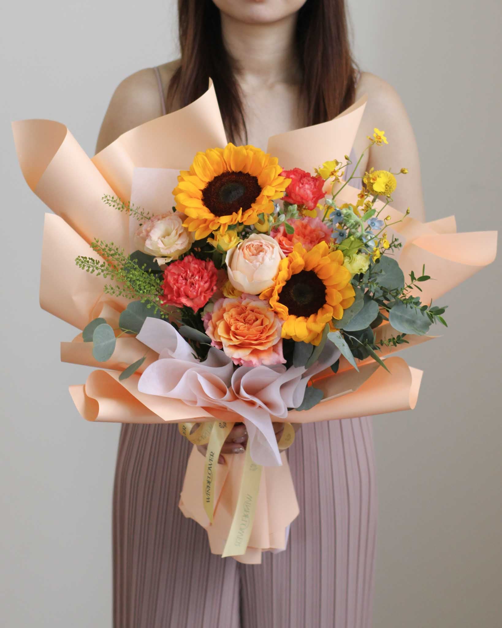 Sunburst Bliss Hand Bouquet | Free Same-Day Flower Delivery Singapore
