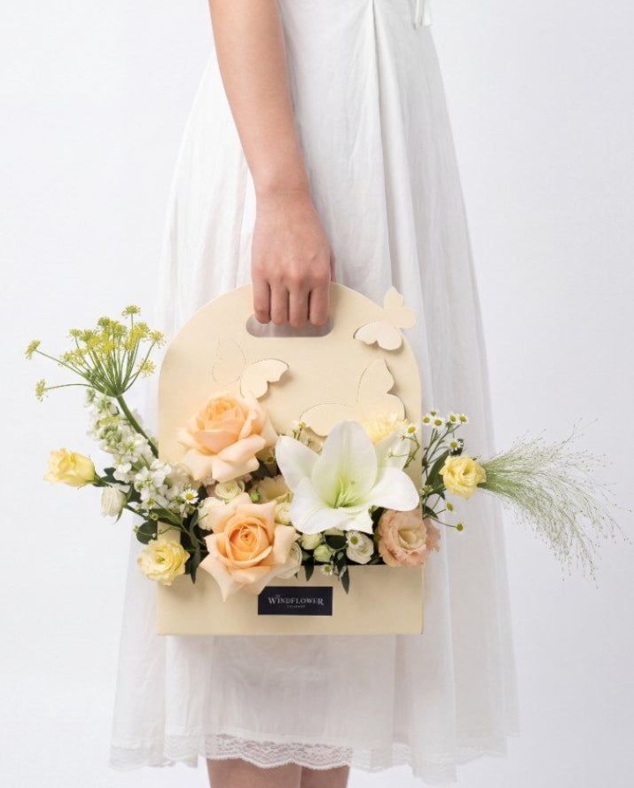 Buttercream Flower Box — White lily and peach roses in a cream butterfly carrier | Windflower Florist Singapore