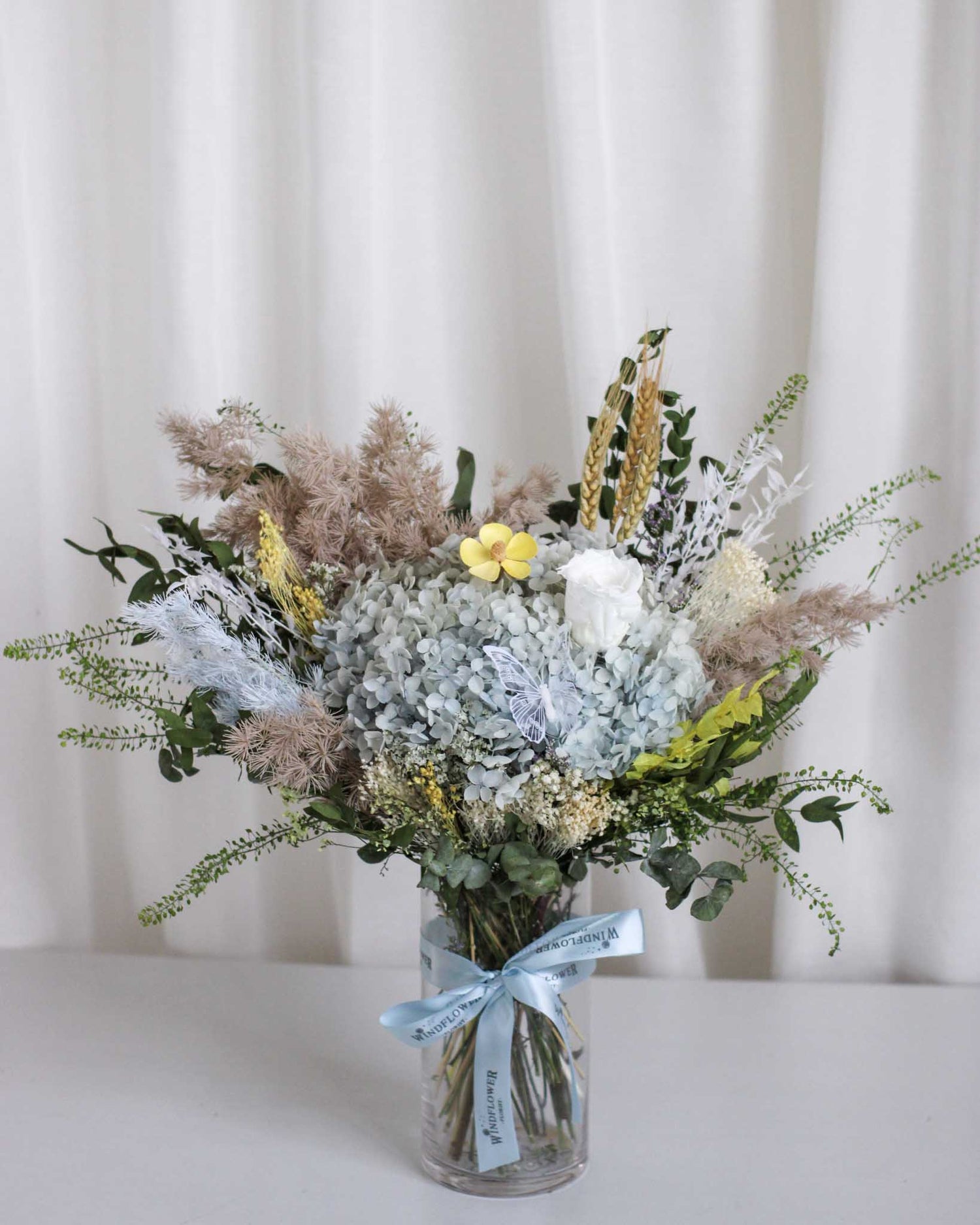 Calm Reverie Hand Bouquet by Windflower Florist Singapore