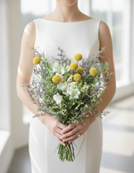 Modern bride holding the Meadows Bridal Bouquet