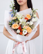 Orange Rose & White Lily Bouquet — apricot and orange roses with white lilies and blue delphinium