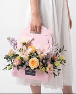 Papillon Flower Box — Blush lilies and peach roses in a pink butterfly carrier | Windflower Florist Singapore