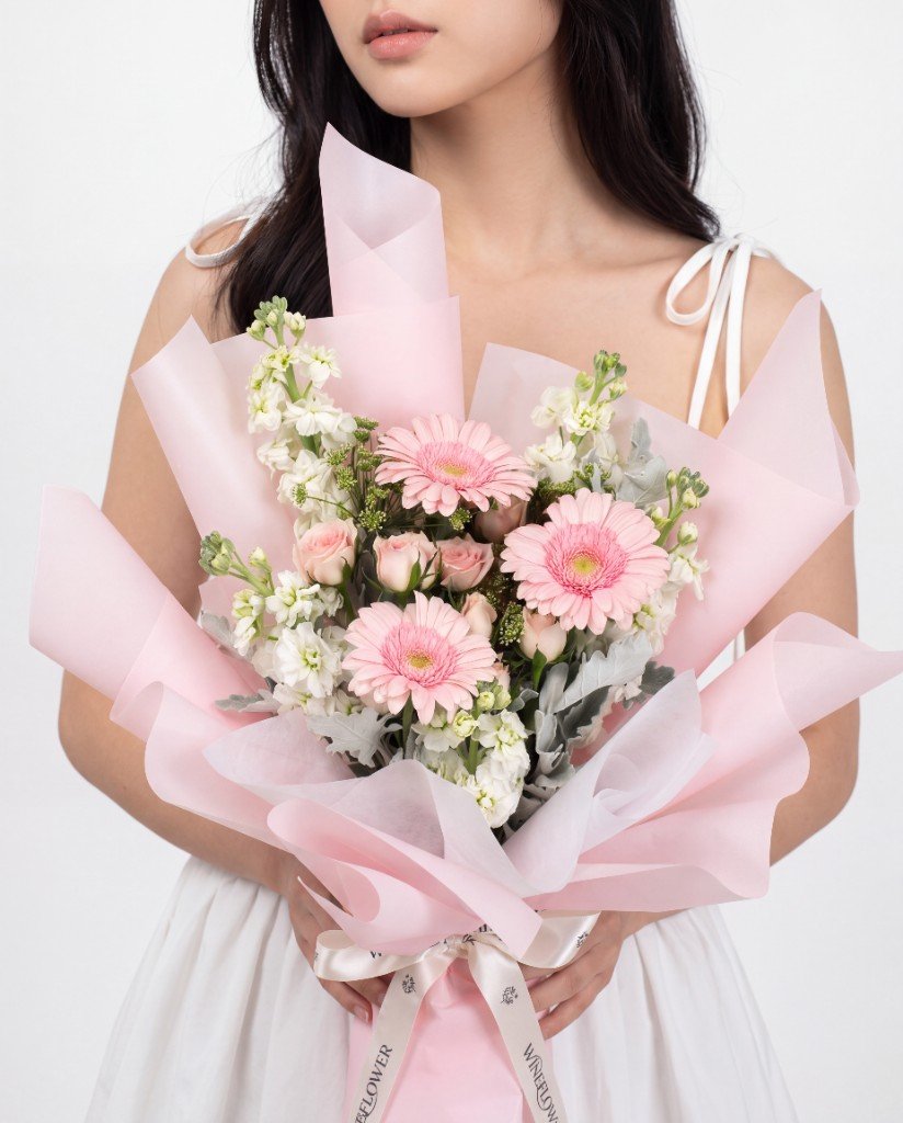 Bonbon — blush pink germini with spray roses and white matthiola