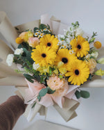 Daisy-Me-Rolling in Yellow Hand Bouquet by Windflower Florist Singapore