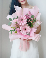 Daisy-Me-Rolling in Pink Hand Bouquet | Free Same-Day Flower Delivery Singapore