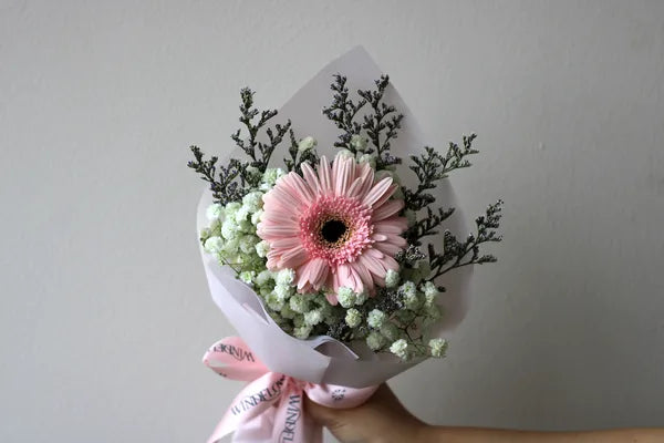 Pink gerbera mini bouquet with baby's breath from floral bar